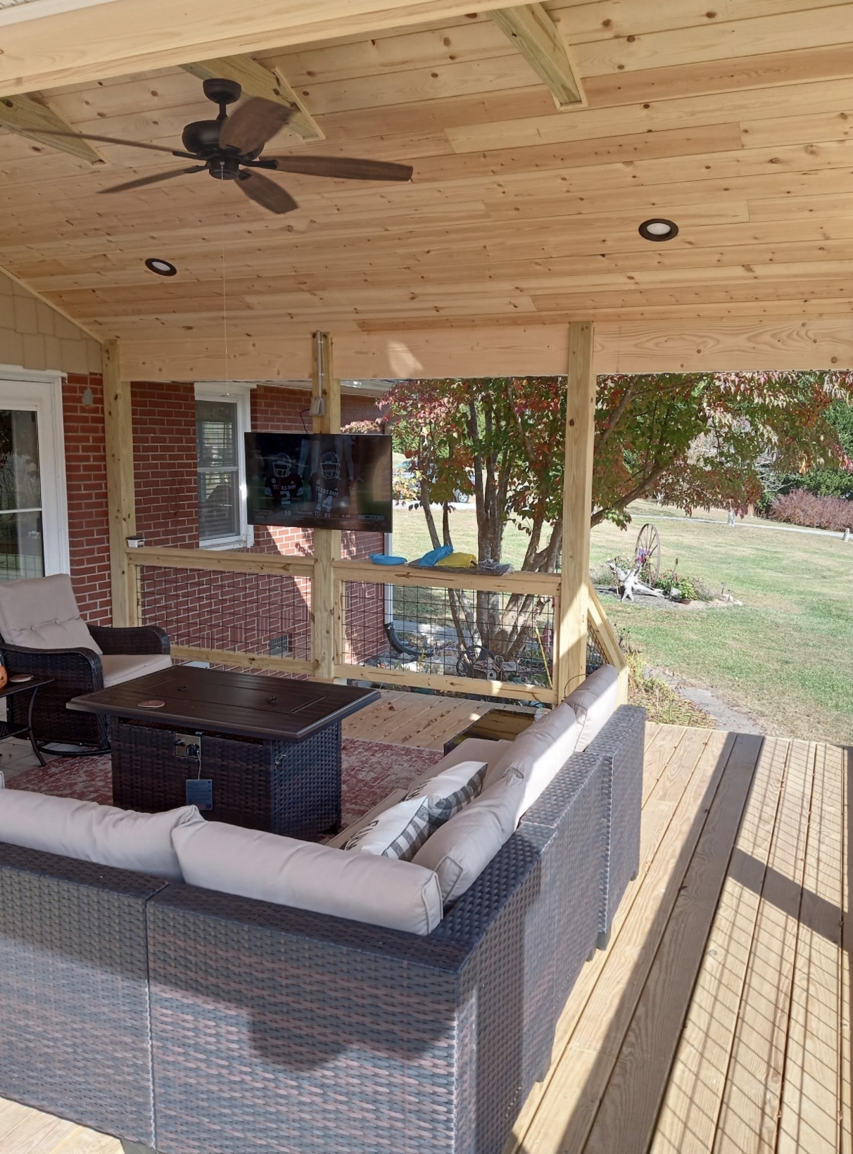 Covered porch with T&G ceiling and sectional seating — WNC