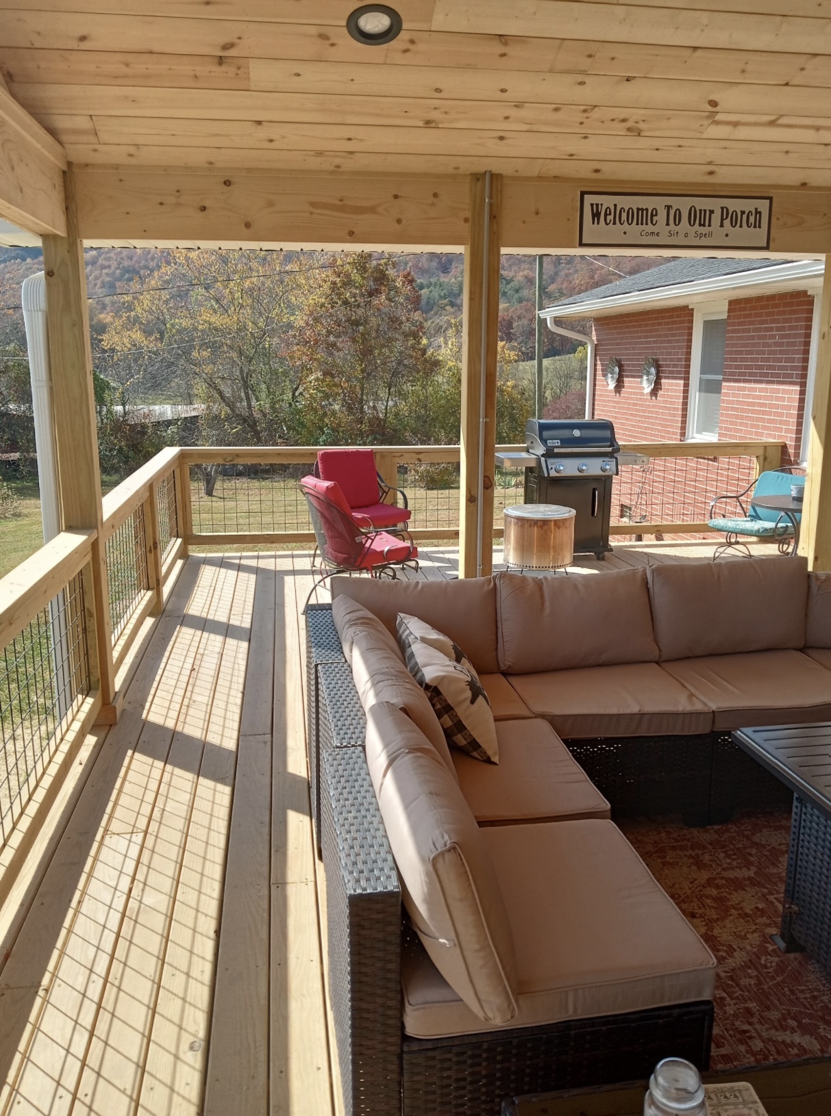 Covered porch with T&G pine ceiling and autumn mountain view — WNC